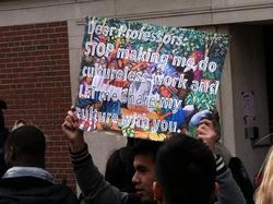Student holding up colorful poster