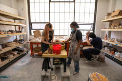 Ceramics students at work in the studio