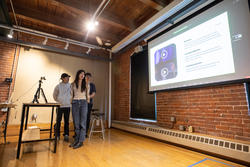 Students present their final designs at crits in an industrial design classroom