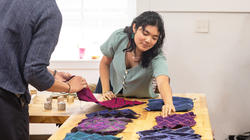Senior Sarah Khadraoui shows textiles samples she created for Hyundai studio 2023
