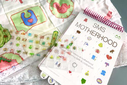 SMS Motherhood, a series of glyphs that Emma Caamaño designed and printed onto a keyboard cover and handmade quilt along with a guide book