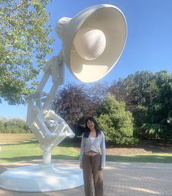 Ivery Chen poses with the Pixar lamp in Emeryville, CA
