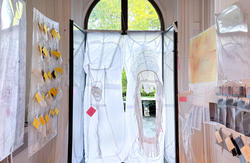 Student work by Architecture graduate alum Lola Deng of an open window with various attached contraptions.
