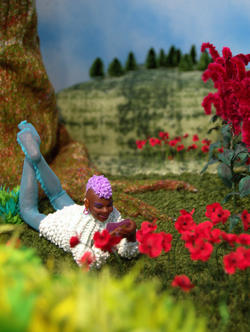 Student work by Illustration graduate alum Jenine Bressner of a person with purple hair and blue tights reading by a tree in a landscape with red flowers.