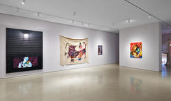 Paintings on view in a gallery