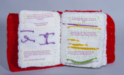 A crocheted book with instructions