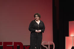 Ryan Cunningham gives a speech at TEDxRISD