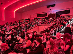 A packed auditorium gathers at TEDxRISD event
