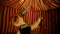 A still from an animation showing a chicken swallowing a sword in a carnival