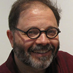a photo portrait of RISD faculty member Mickey Ackerman